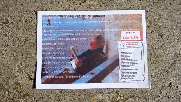 A laminated picture is seen on the grave of Willy Herteleer, a homeless man buried in the Teutonic Cemetery at the Vatican, Feb. 27, 2015. 