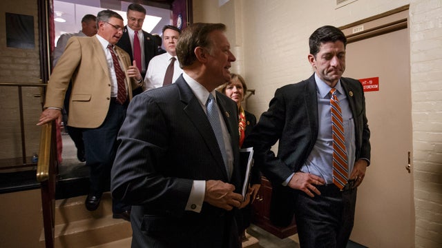 House Ways and Means Committee Chairman Paul Ryan, R-Wis., right, and other House Republicans emerge from closed-door meeting in basement of the Capitol on night of Feb. 26, 2015 on how to deal with the impasse over the Homeland Security Department budget 