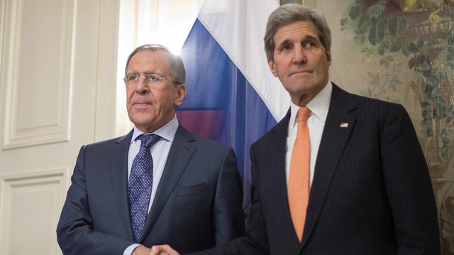 Secretary of State John Kerry shakes hands with Russian Foreign Minister Sergey Lavrov at the start of their bilateral meeting at the 51st Munich Security Conference (MSC) in Munich, southern Germany 