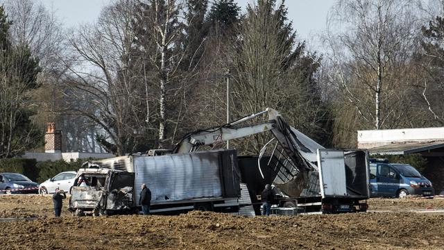 Burnt out vans are seen along the Avallon motorway on March 11, 2015, after a group of "battle-hardened" armed thieves attacked the two heavily guarded vans carrying jewels at the Avallon French motorway toll in the dead of night.  Getty 