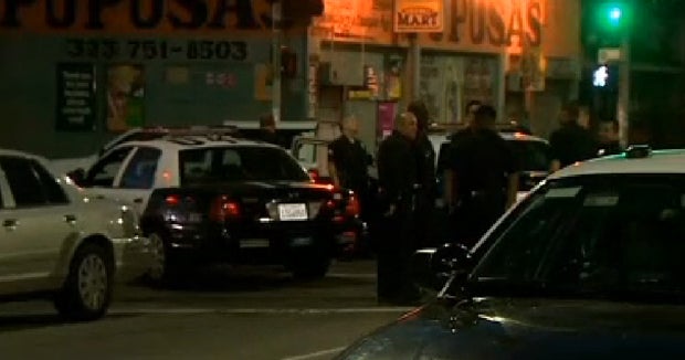 Search for gunmen after 2 LAPD officers shot - CBS News