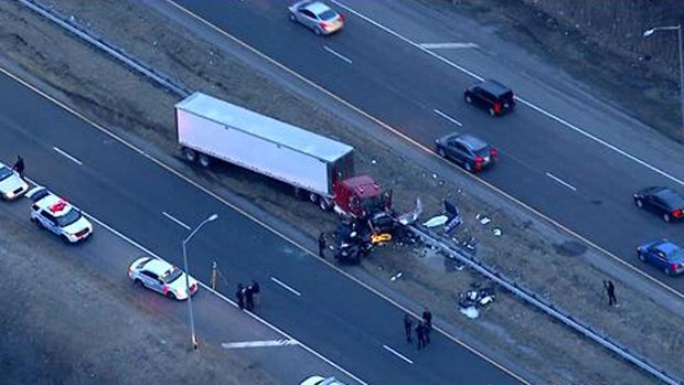 ​Crews work the scene after a fatal wrong-way crash in the Staten Island borough of New York City March 20, 2015. 