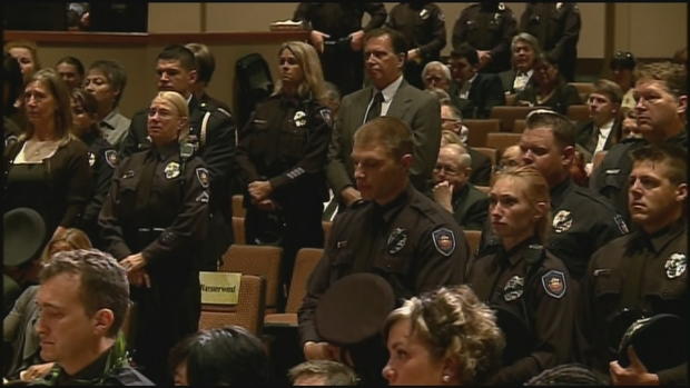 officers gather in courtroom for denner 