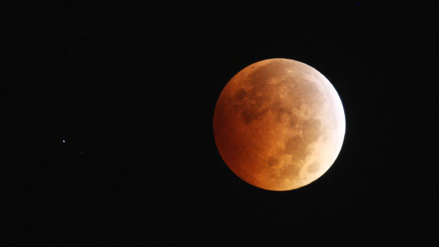 The Drama of a Total Lunar Eclipse  