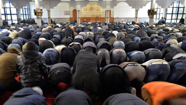 Muslim people take part in the Friday prayer at the Assalam mosque Jan. 23, 2015, in the western French city of Nantes. 