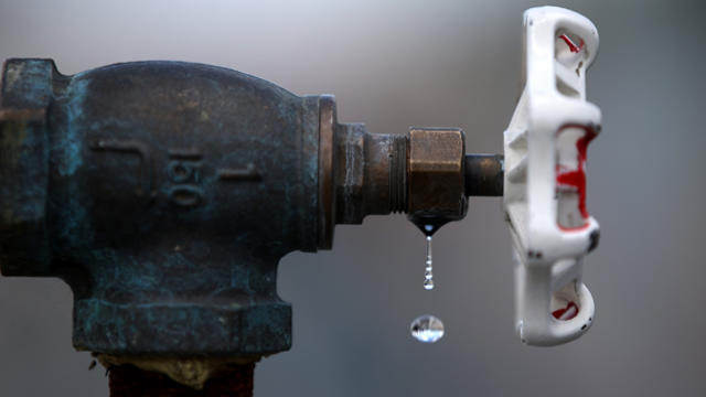 Water drips from a faucet at the Dublin San Ramon Services District residential recycled water fill station April 8, 2015, in Pleasanton, California. 