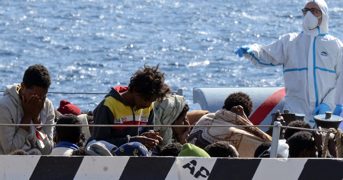 Hundreds missing as migrant boat capsizes north of Libya - CBS News