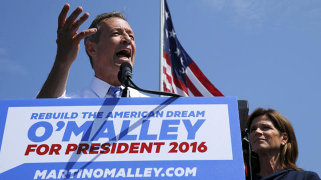 Former Maryland Gov. Martin O'Malley is joined by his wife, Katie O'Malley, as he announces his intention to seek the Democratic presidential nomination during a speech in Federal Hill Park in Baltimore, Maryland, May 30, 2015. 