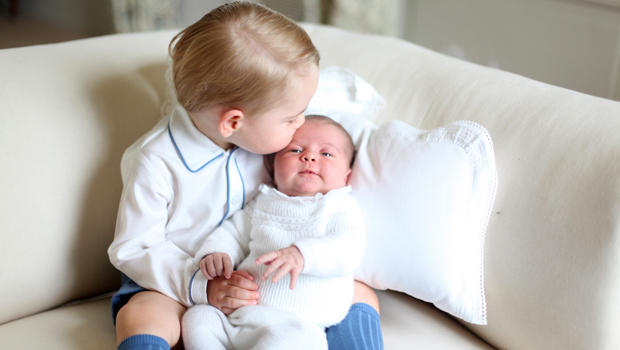 Britain's Princess Charlotte is held by her brother, 2-year-old Prince George, in this image taken by Kate, Duchess of Cambridge, at Amner Hall, England, in mid-May 2015 and made available by Kensington Palace June 6, 2015. 