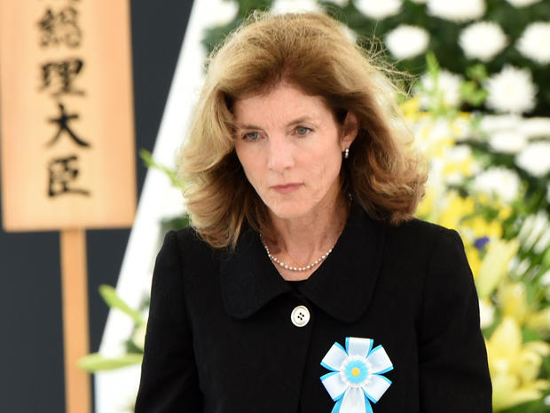 US Ambassador to Japan Caroline Kennedy returns to her seat after offering a flower on an altar during a memorial service for those who died in the Battle of Okinawa during World War II at the Peace Memorial Park in Itoman, in Japan's southern island of Okinawa prefecture 