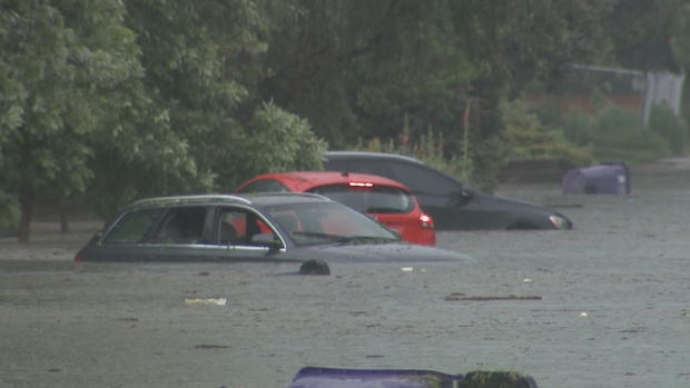 flooded cars, park hill neighborhood 