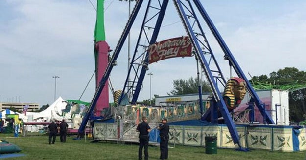Man dives under carnival ride in apparent suicide - CBS News