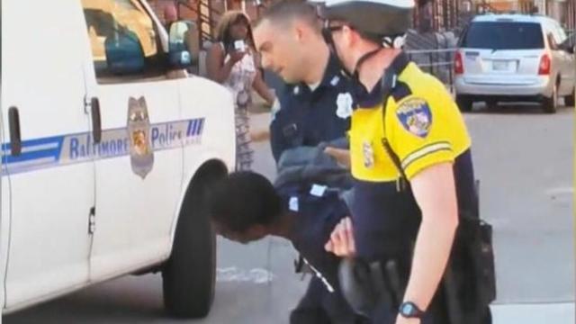 Baltimore officers arrest Freddie Gray, who was severely injured in police custody on April 12, 2015, and died five days later. 