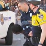 Baltimore officers arrest Freddie Gray, who was severely injured in police custody on April 12, 2015, and died five days later. 