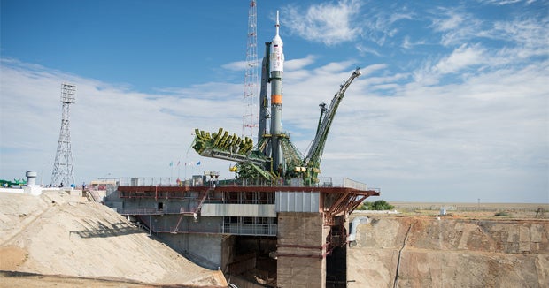 Three-man crew set for launch to space station - CBS News