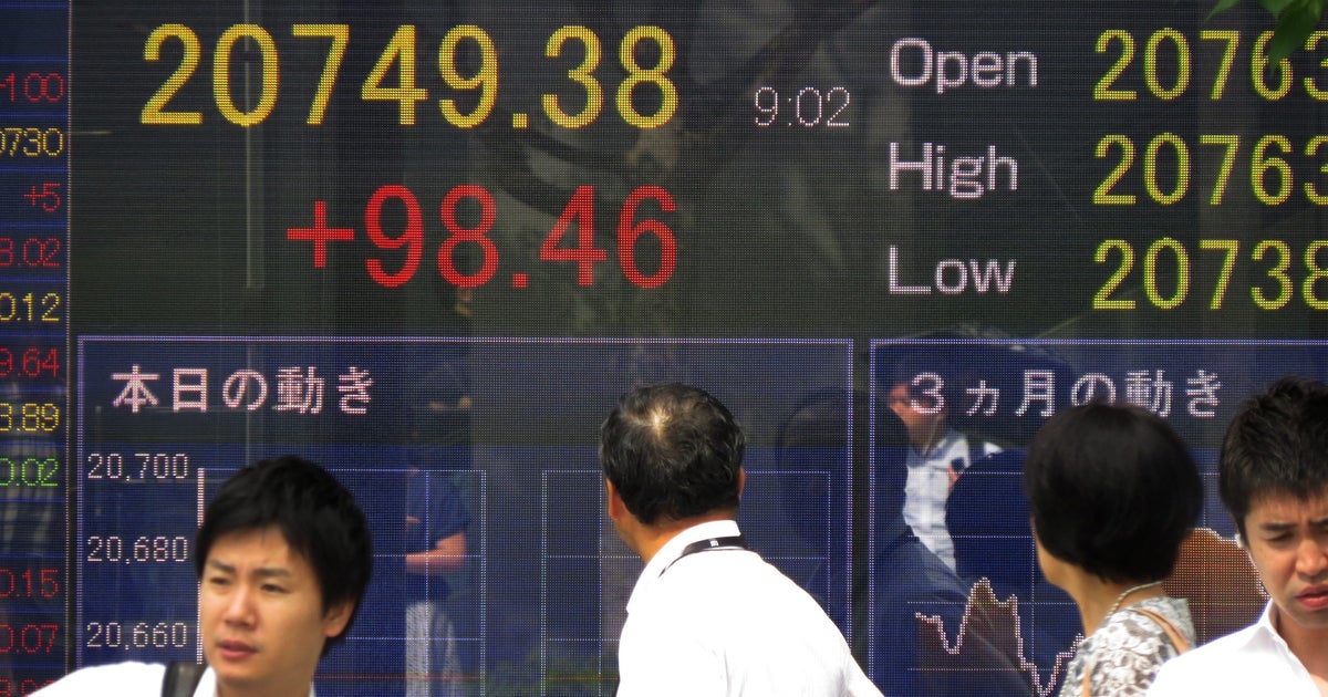 World stocks uneven as investors mull corporate earnings - CBS News