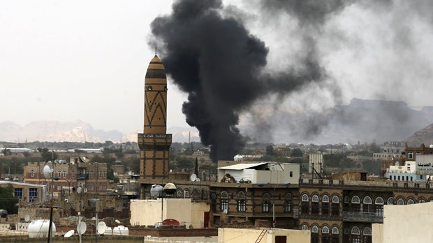 Smoke billows from the military academy during a Saudi-led airstrike in Yemen's capital, Sanaa, Sept. 2, 2015. 
