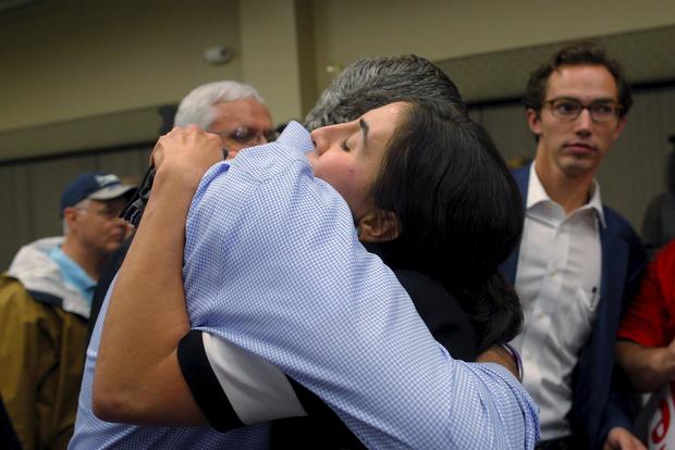 Jeb Bush hugs audience member Nora Barre at campaign town hall meeting Bedford, New Hampshire on September 30, 2015; Barre, whose 14 family members escaped from Syria to Turkey, asked Bush a question about the refugee crisis in the Middle East and Europe 