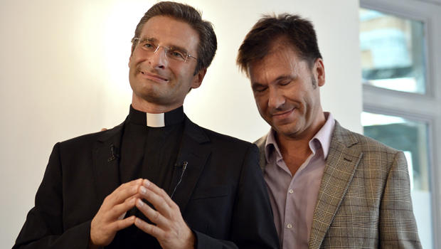 Krzysztof Charamsa, who works for a Vatican office, gives a press conference with his partner Eduard to reveal his homosexuality Oct. 3, 2015, in Rome. 