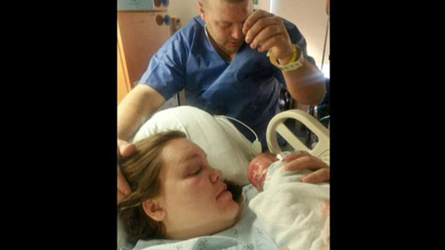 ​Brittany Beaudoin and her husband Denis are seen after the birth of their son, Aiden, Nov. 3, 2015. 