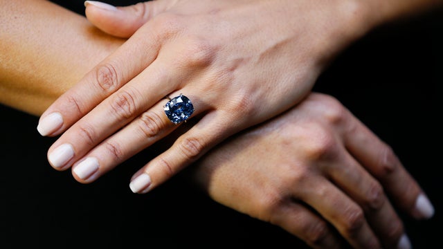 The rare "Blue Moon" diamond is displayed at Sotheby's auction rooms in London Sept. 17, 2015. 