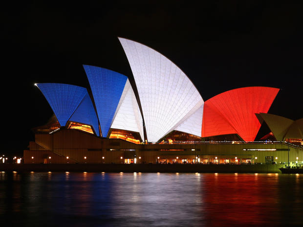 The sails of the Sydney Opera House are illuminated in the colors of the French flag on Nov. 14, 2015, in Sydney, Australia, in solidarity with the people of France. 
