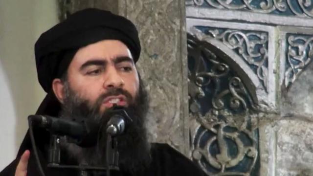 A still photo from video posted on a militant website July 5, 2014, purports to show the leader of the Islamic State of Iraq and Syria, Abu Bakr al-Baghdadi, delivering a sermon at a mosque in Iraq during his first public appearance. 
