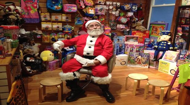 Santa sets up shop in a San Francisco toy store, 2014 