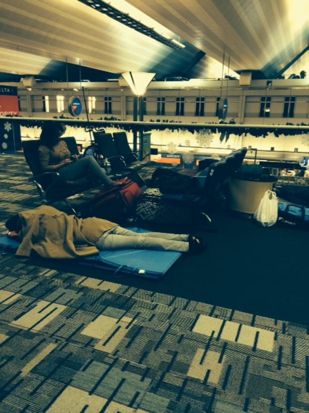 Delayed Passengers Sleeping At Airport 