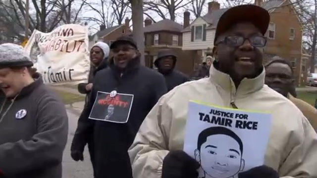 ​Protesters demonstrate outside Cuyahoga County Prosecutor Tim McGinty's home in Cleveland Jan. 1, 2016. 