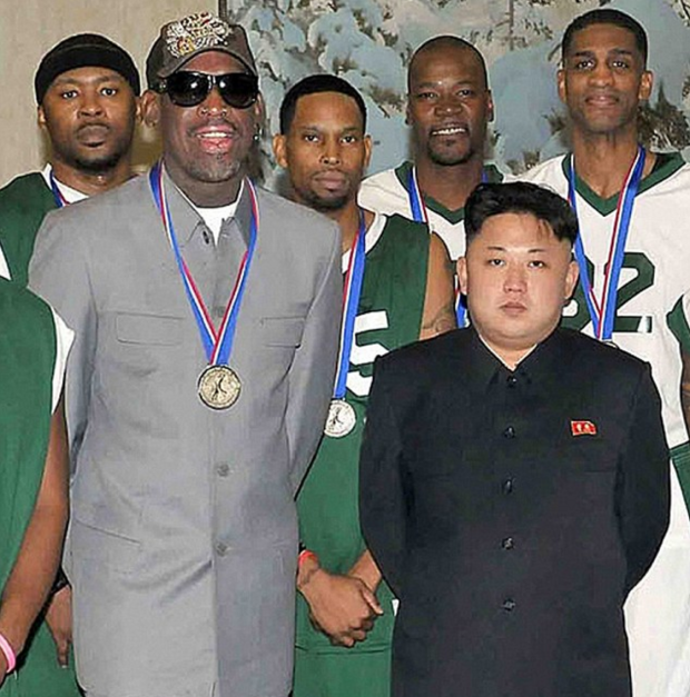 NBA star Dennis Rodman poses with Kim Jong Un in Pyongyang in a photo released in January 2014. 