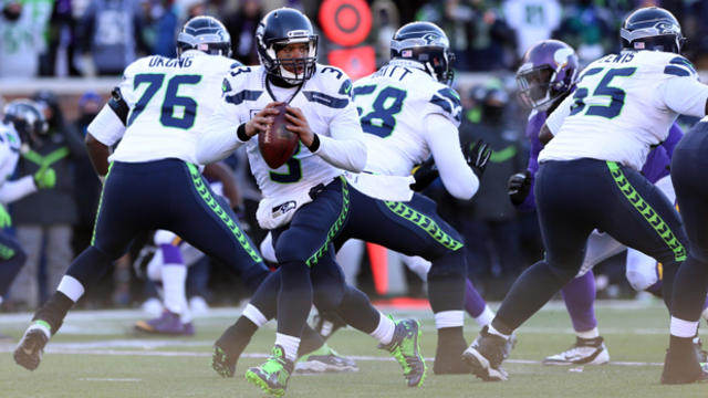Seattle Seahawks quarterback Russell Wilson, No. 3, drops back to pass against the Minnesota Vikings in the second half of a NFC Wild Card playoff football game at TCF Bank Stadium in Minneapolis Jan. 10, 2016. 