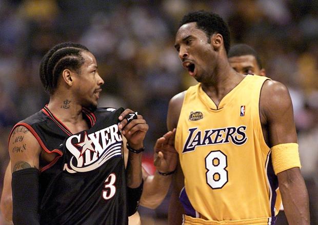 Allen Iverson (L) of the Philadelphia 76ers and Ko 