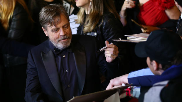 Mark Hamill signing an autograph 