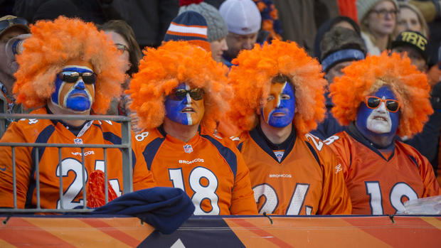 Denver Broncos Fans With Wigs On 