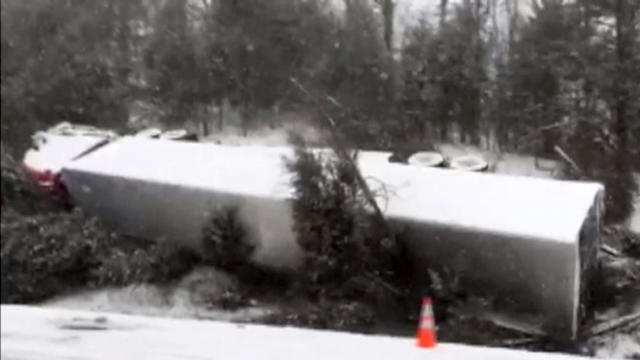 A truck driver lost control, slid off the road and struck several trees before coming to a stop in Hamblen County, Tennessee, Jan. 20, 2016. 