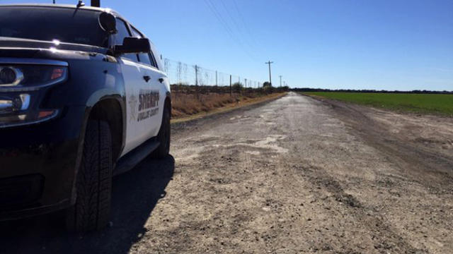 A​ Uvalde County Sheriff's Department vehicle is seen outside a perimeter during a standoff Feb. 6, 2016. 