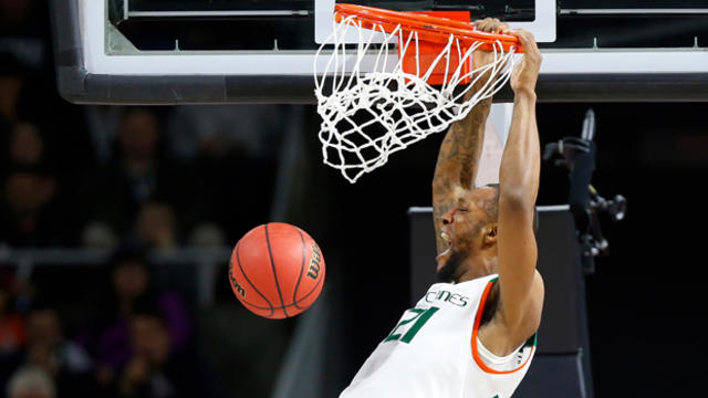 Miami Hurricanes forward Kamari Murphy (21) dunks against the Wichita State Shockers during the first half of a second round game of the 2016 NCAA Tournament at Dunkin Donuts Center in Providence, R.I., on March 19, 2016. 