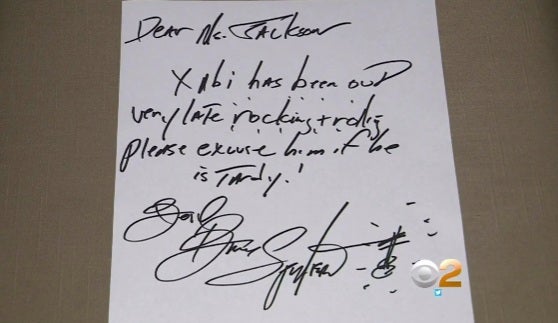 Bruce Springsteen writes school tardy note for young fan - CBS News