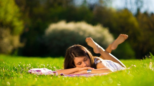 woman-lying-in-grass.jpg 