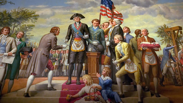 A mural depicts the first U.S. president and a member of the Freemasons, George Washington, as he lays the cornerstone of the U.S. Capitol on Sept. 18, 1793, in Memorial Hall at the George Washington Masonic National Memorial in Alexandria, Virginia, on N 