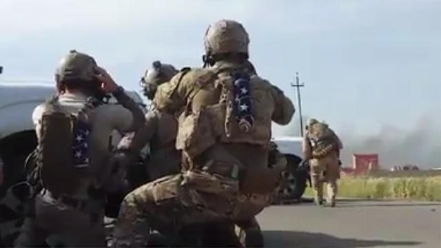 Video handed to The Guardian newspaper appears to show U.S. Navy SEALs engaged in a gun battle in Tel Asqof, Iraq, May 4, 2016, alongside Kurdish peshmerga forces, after coming under attack by ISIS militants 