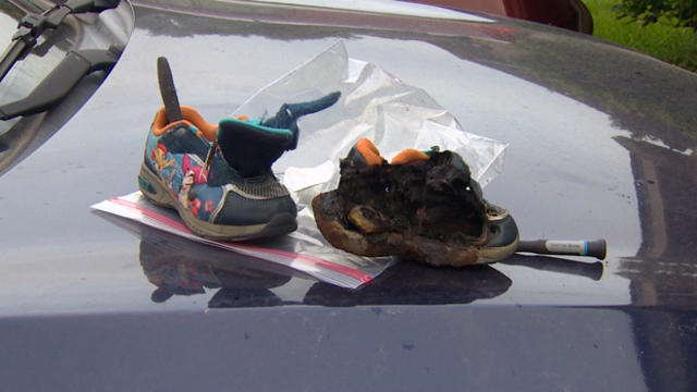 ​A Texas boy's sneakers are seen after a fire inside a SUV in Katy, Texas, on May 7, 2016. 