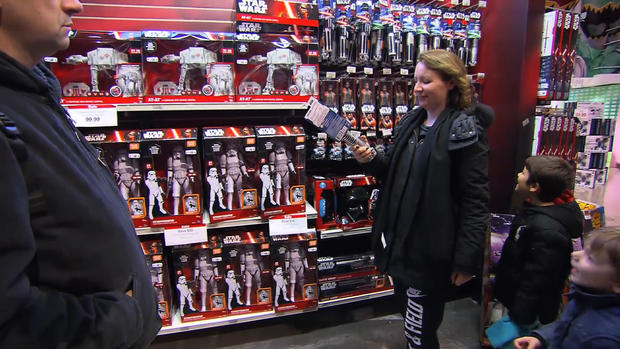 Family Buying Star Wars Toys 