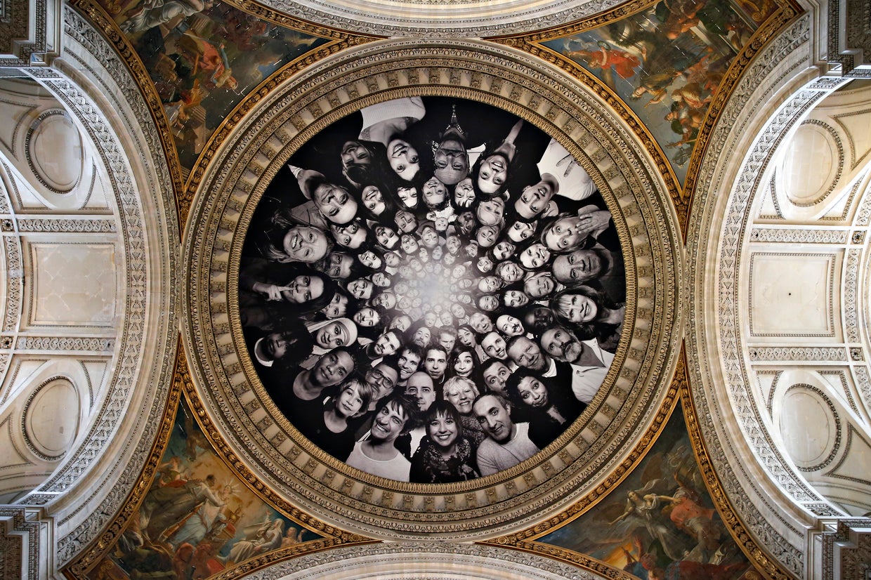 French street artist JR makes the Louvre Pyramid disappear