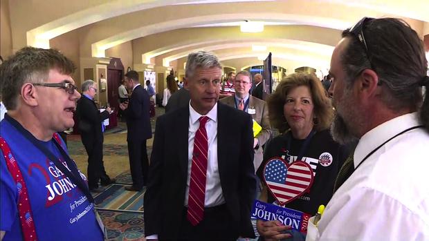 Libertarian presidential candidate and former New Mexico Gov. Gary Johnson talks with supporters at the Libertarian National Convention in Orlando, Florida, on May 27, 2016. 