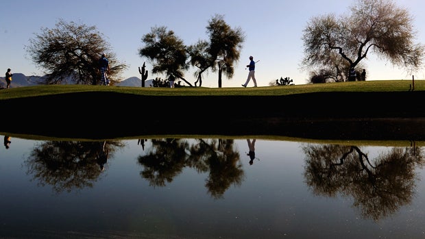 Justin Hicks walks the green on the 12th hole during the final round of the Waste Management Phoenix Open at TPC Scottsdale on Feb. 2, 2014, in Scottsdale, Arizona. 