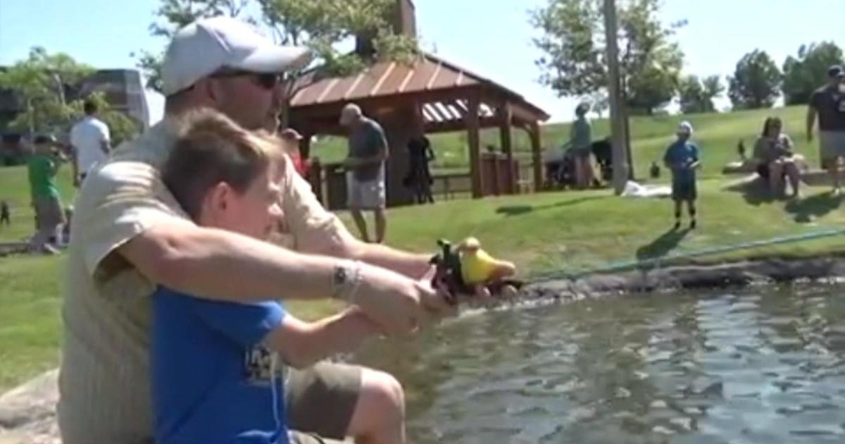 Kids Learn How To Fish With Police Officers At 'Cops & Bobbers