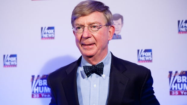 Conservative newspaper columnist George Will poses on the red carpet upon arrival at a salute to Fox News Channel's Brit Hume on Jan. 8, 2009, in Washington. 