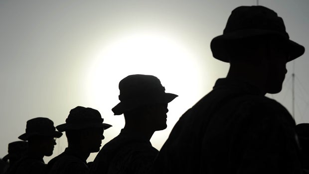 U.S. soldiers of the 82nd Airborne Division take part in a military parade to welcome their new command at the Arghandab Base in Kandahar, Afghanistan, on Aug. 9, 2010. 